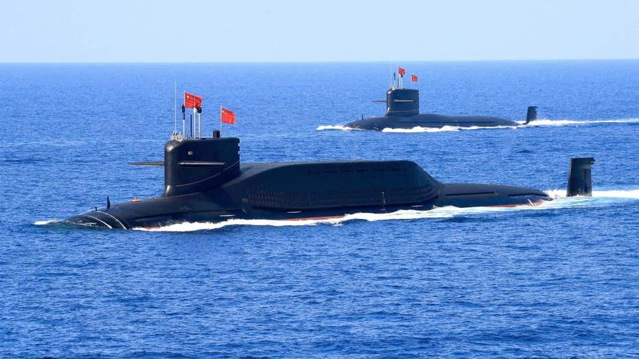 China launches rare submarine ballistic missile test as Pacific allies deepen defense ties